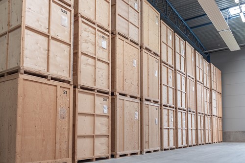 A view from our Alfa warehouse with brown Alfa storage boxes lined up in rows for storage of your personal belongings.